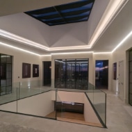 Cove and ceiling illuminated by white coloured LED lighting